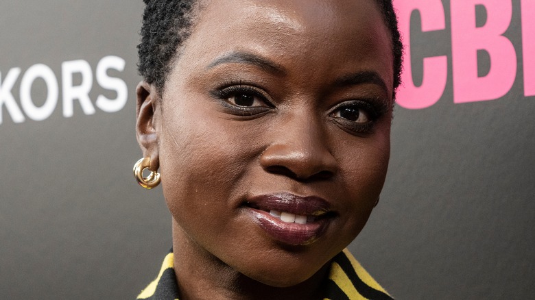 Danai Gurira smiling into camera