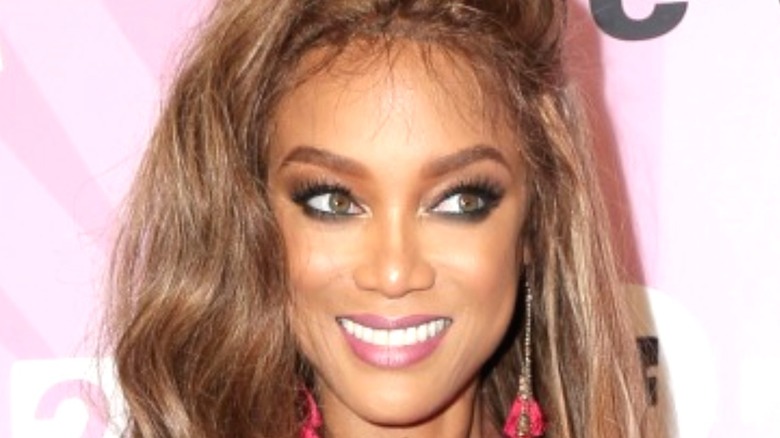 Tyra Banks at a red carpet event 