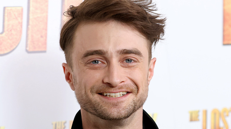Daniel Radcliffe smiling on red carpet