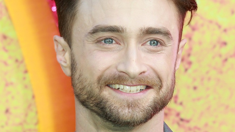 Daniel Radcliffe smiling at event