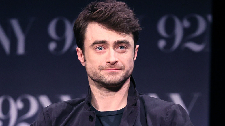 Daniel Radcliffe smiling slightly