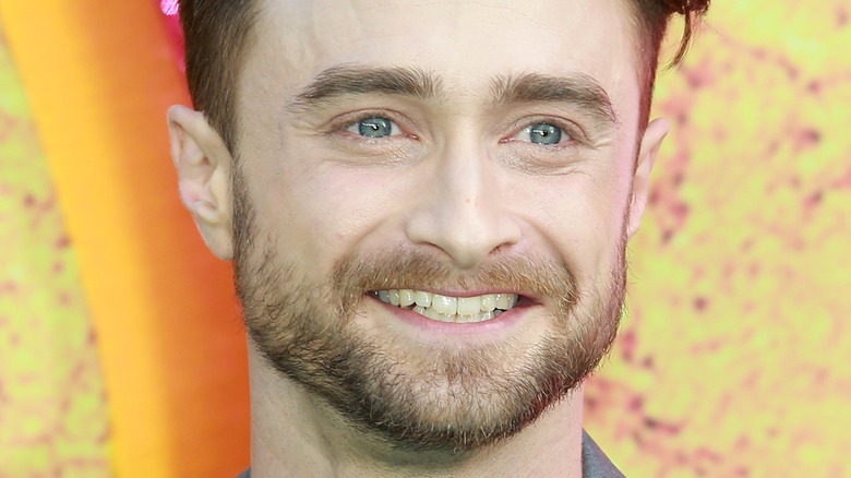 Daniel Radcliffe at event smiling