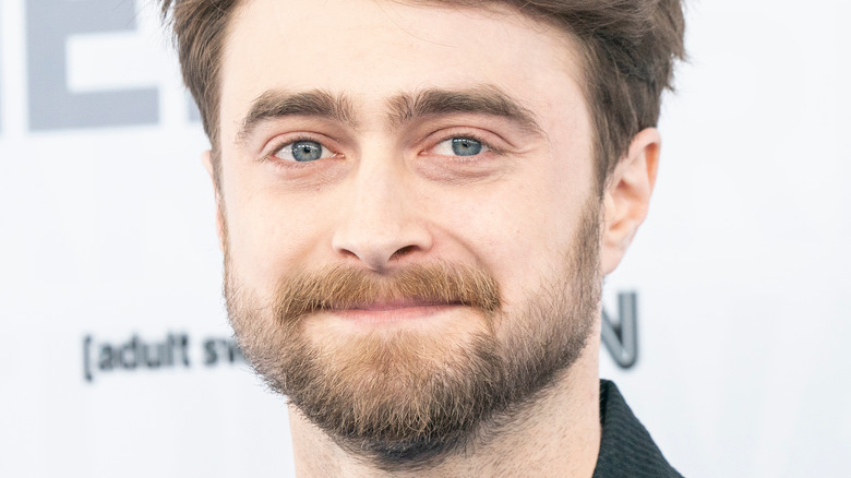 Daniel Radcliffe posing on the red carpet