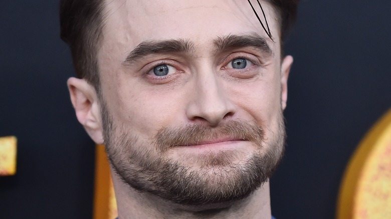 Daniel Radcliffe smiling on the red carpet