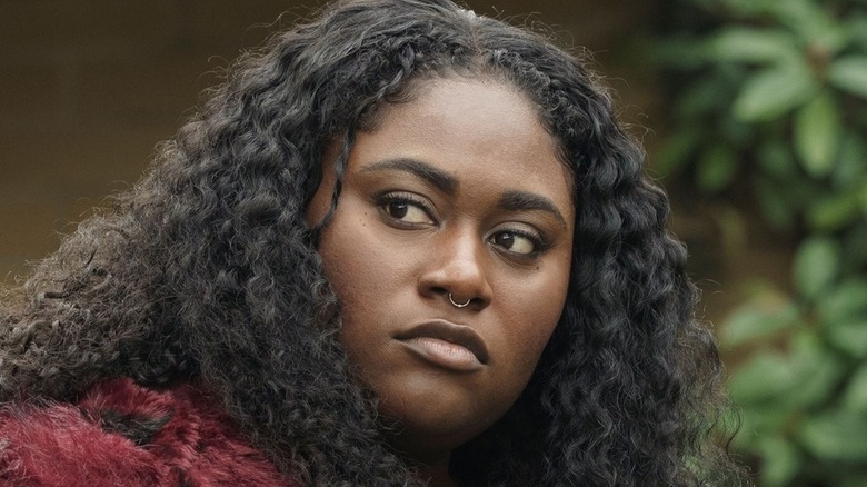 Danielle Brooks turning to the right in "Peacemaker"