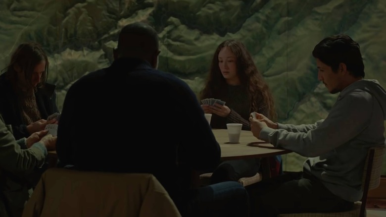 The cast of No Exit playing cards