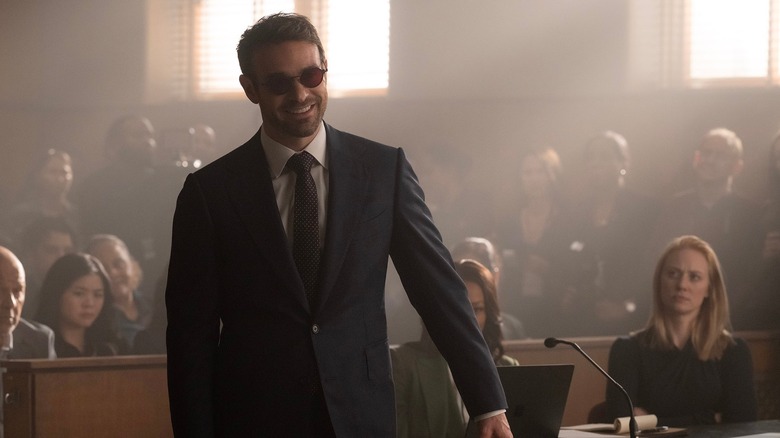 Matt Murdock standing beside Karen Page in courtroom in "Daredevil: Born Again" (2025-present)