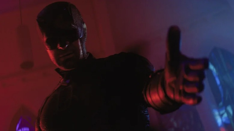 Daredevil reaching out his left hand in "Daredevil: Born Again" (2025-present)