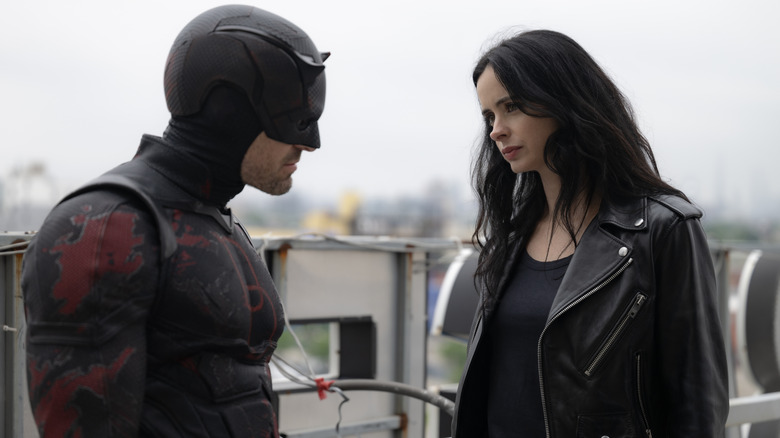 Daredevil and Jessica Jones standing outside together in 