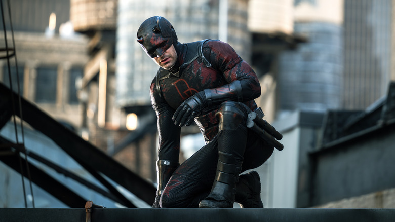 Daredevil crouching on a roof on Daredevil: Born Again