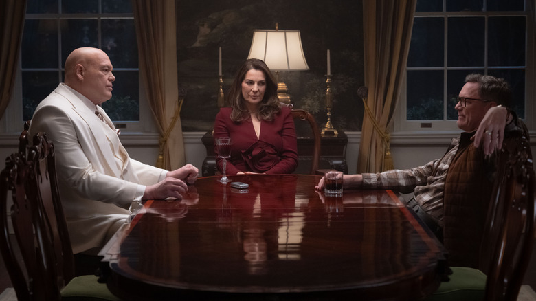 Kingpin, Vanessa Fisk, and Mr. Charles sitting at a table in Daredevil: Born Again