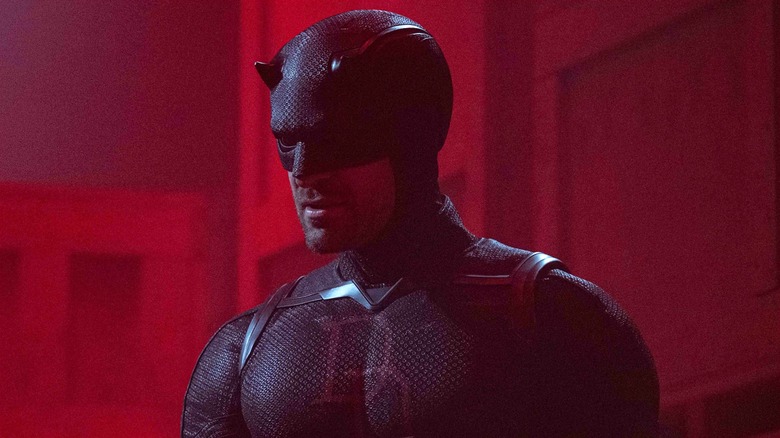Daredevil standing in a room with red lighting in "Daredevil: Born Again" Season 2