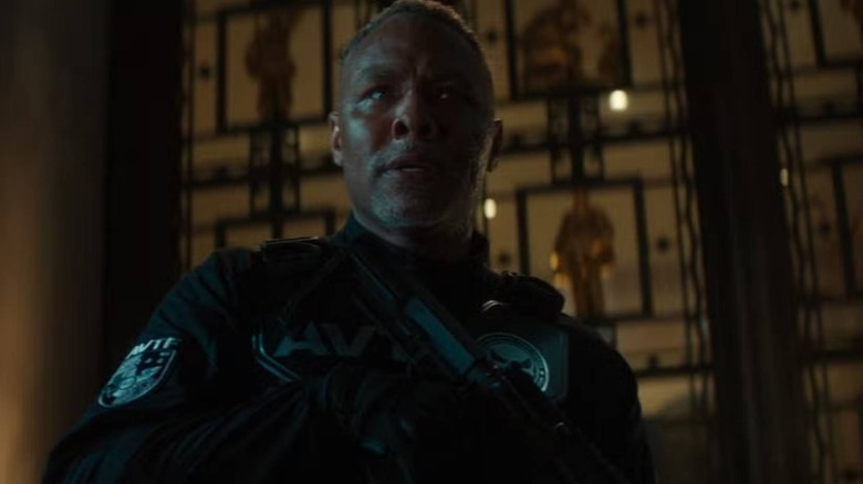 Cole North holding a gun on Daredevil: Born Again