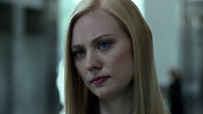 Karen Page looking on