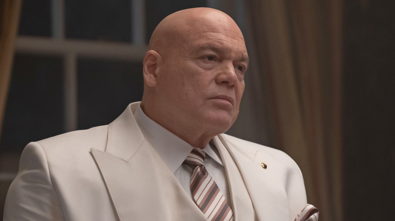 Kingpin wearing a white suit on 