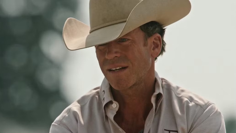 Travis Wheatley in a cowboy hat, staring, in "Yellowstone"