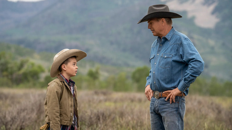 Tate and John Dutton talk in "Yellowstone"