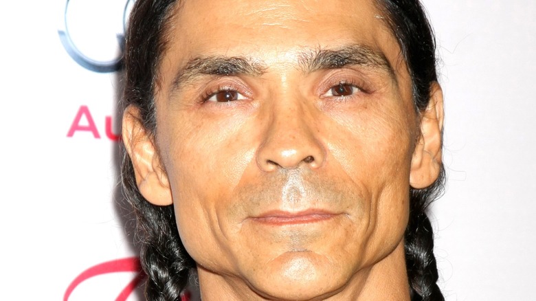 Zahn McClarnon staring sternly