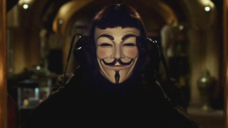 V putting on his mask in V for Vendetta