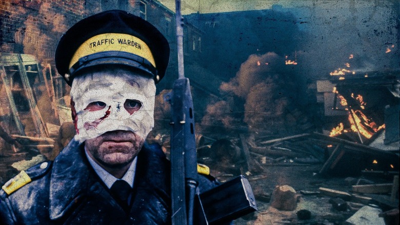 A traffic warden stands among the ruins of Sheffield in "Threads" (1984)