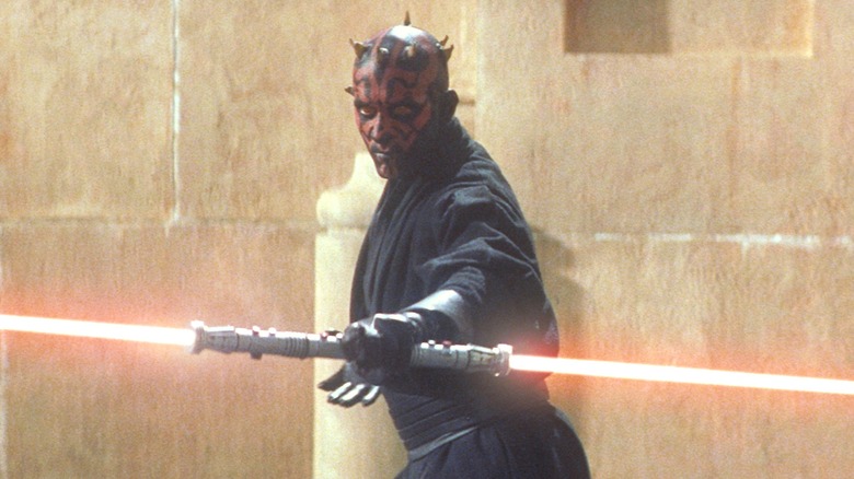 Darth Maul posing with his lightsaber in Star Wars: The Phantom Menace
