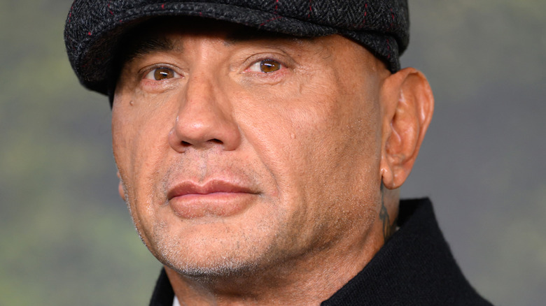 Dave Bautista smiling in tux