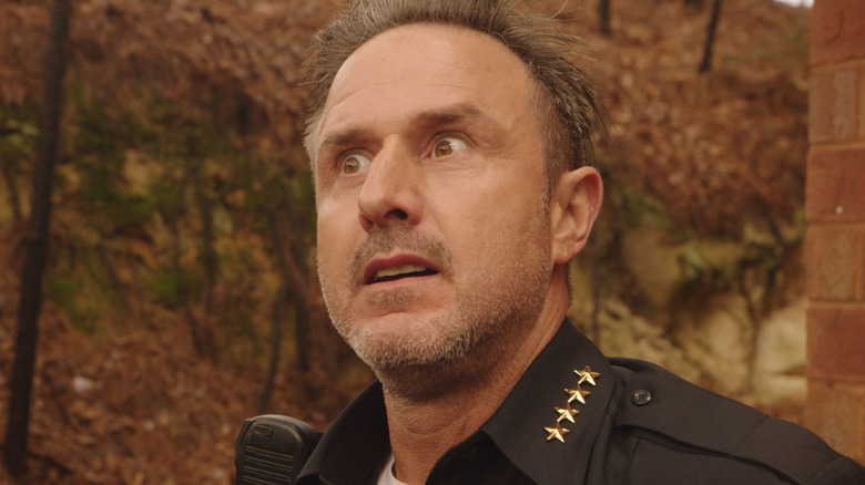 Sheriff Deke standing