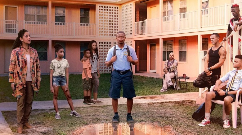 David standing in yard with Gloria, JG, Seren, and others