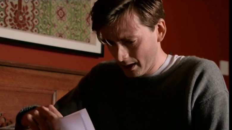 Dave reading a letter