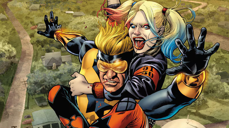 Harley Quinn tussling with Booster Gold in the air above an American, midwestern farm town