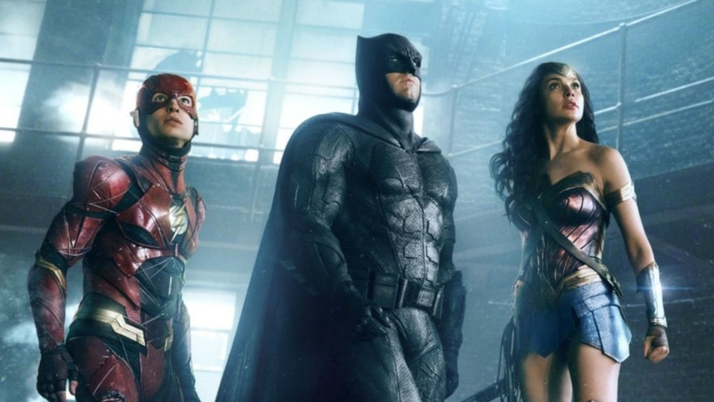 Flash, Batman, and Wonder Woman prepare for looming danger