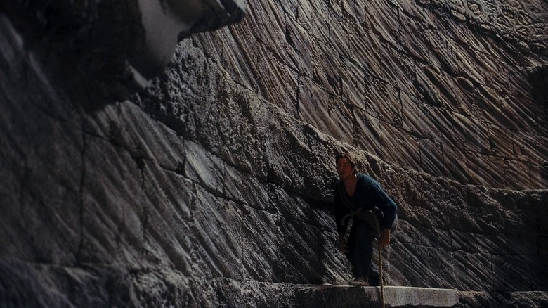 Christian Bale prepares to leap