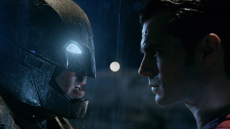 Batman facing Superman