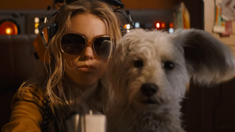 Supergirl and Krypto fly and rock out in 