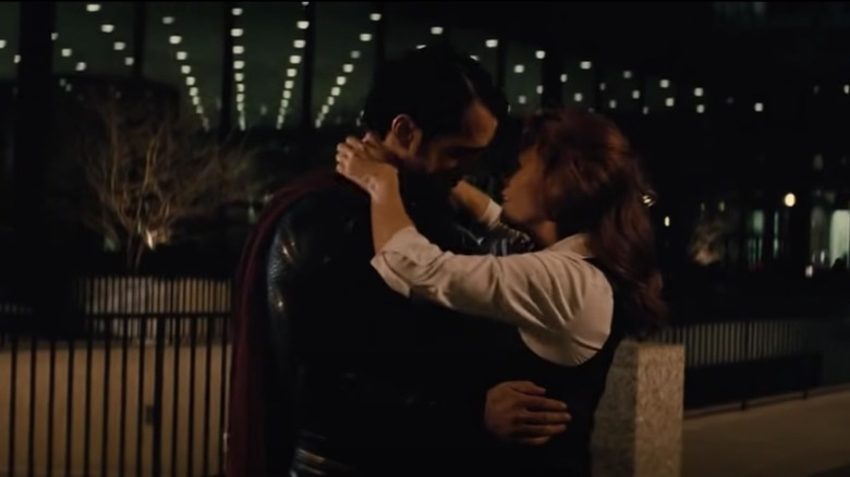 Superman embracing Lois Lane