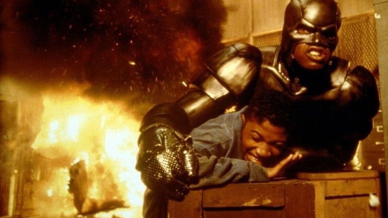 John Henry Irons protecting a child in "Steel"