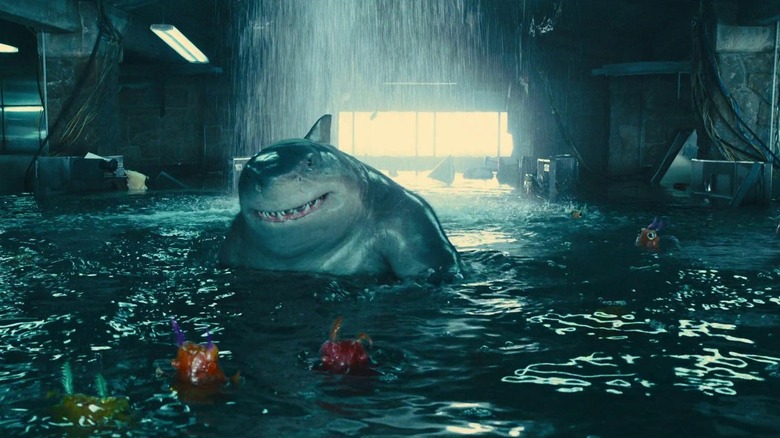 King Shark being approached by dangerous fish in "The Suicide Squad"
