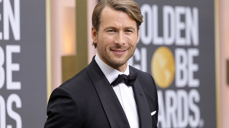 Glen Powell wearing a tuxedo
