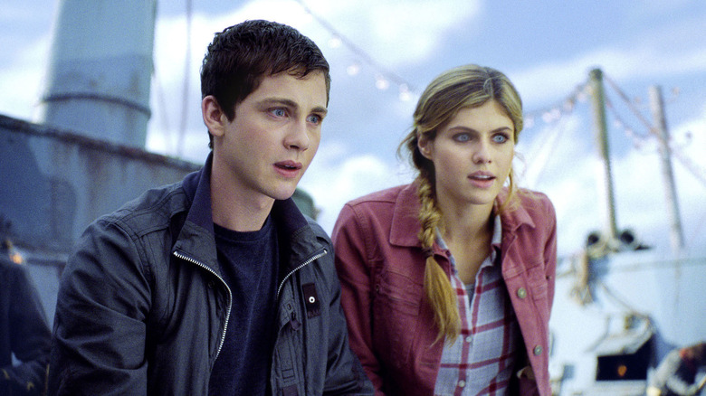 Percy and Annabeth standing on boat