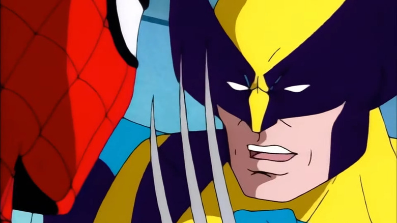 Wolverine aims his claws at Spider-Man