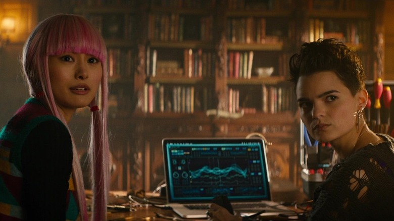 Yukio and Negasonic Teenage Warhead sitting at computer 