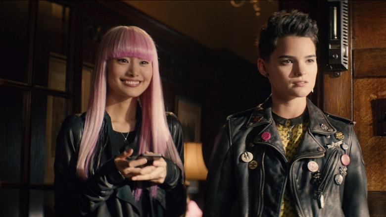 Yukio grinning next to Negasonic Teenage Warhead