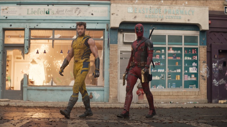 Wolverine walking with Deadpool 