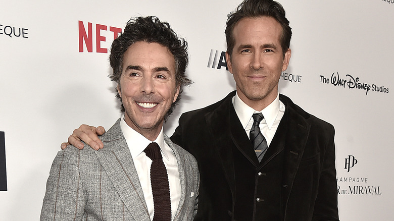 Levy and Reynolds on a red carpet