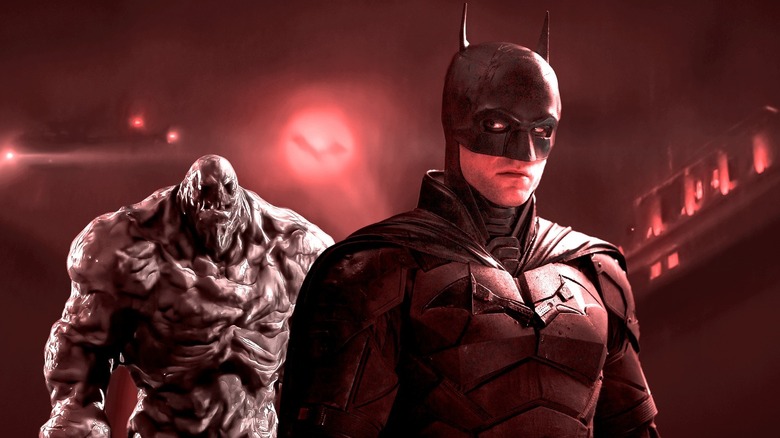 Batman spotting Clayface behind him