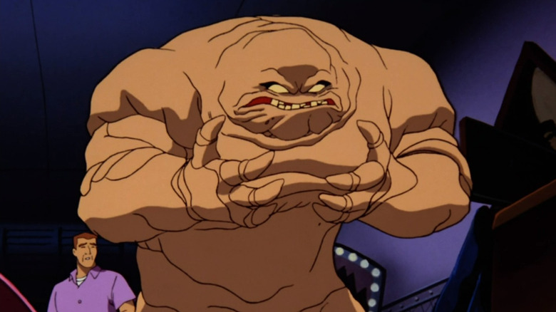 Clayface doubling over in grief
