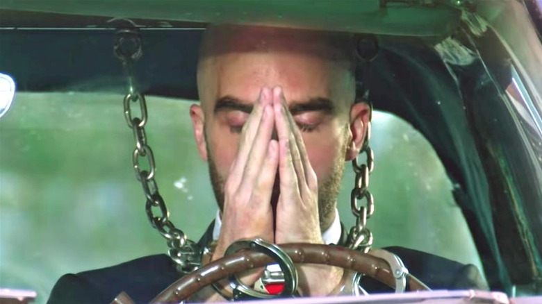 Magician Drummond Money-Coutts handcuffed
