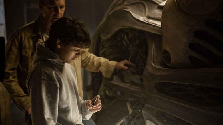 Young Clark Kent investigtating a spaceship in Man of Steel (2013)