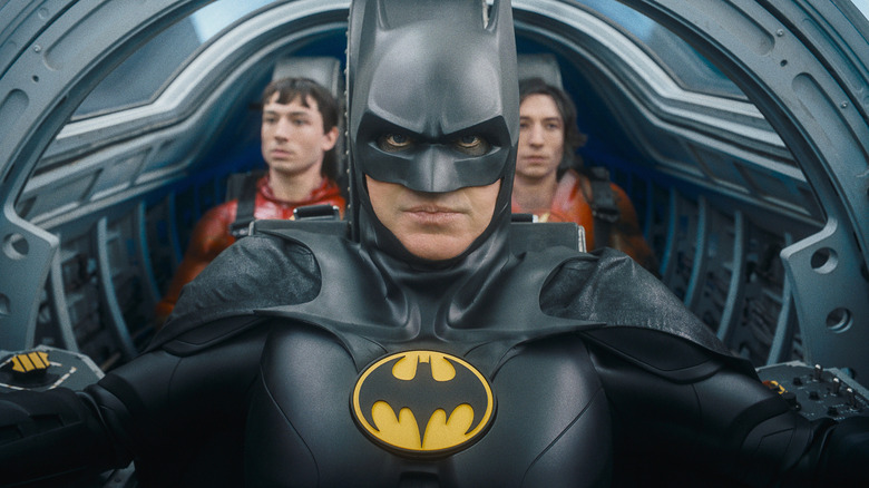Batman drives two versions of Barry Allen in The Flash