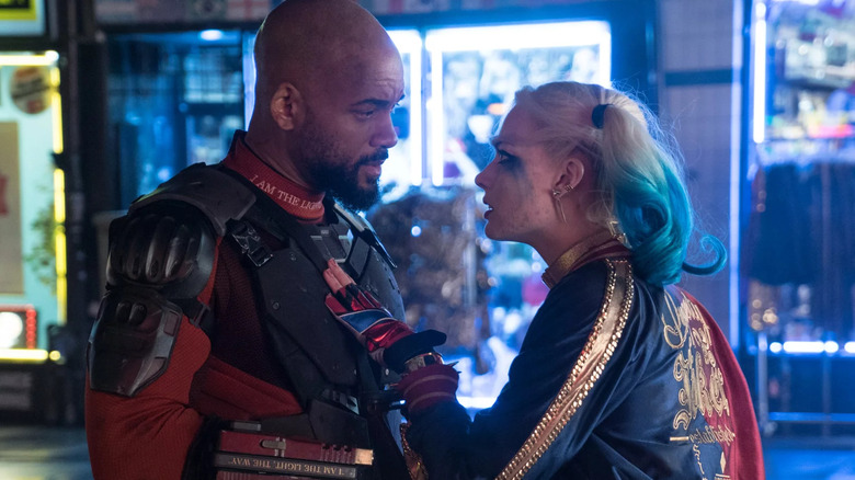 Harley Quinn confronts Deadshot in the street